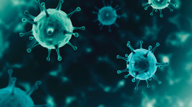 Green glowing coronoviruses in fluid.