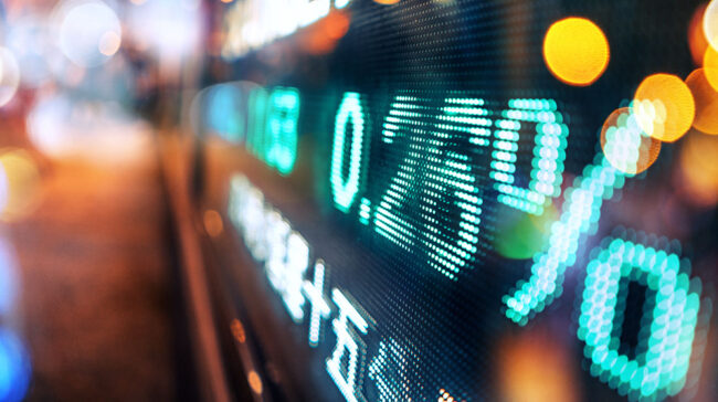 zirp Glowing screen with market performance data