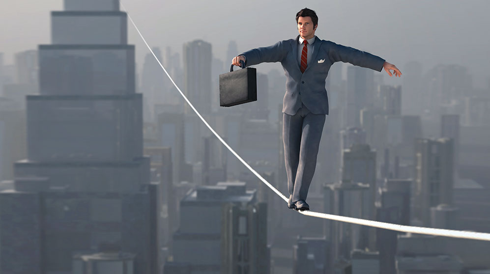 Illustration of a suited man balancing on a tightrope strung between two city buildings.