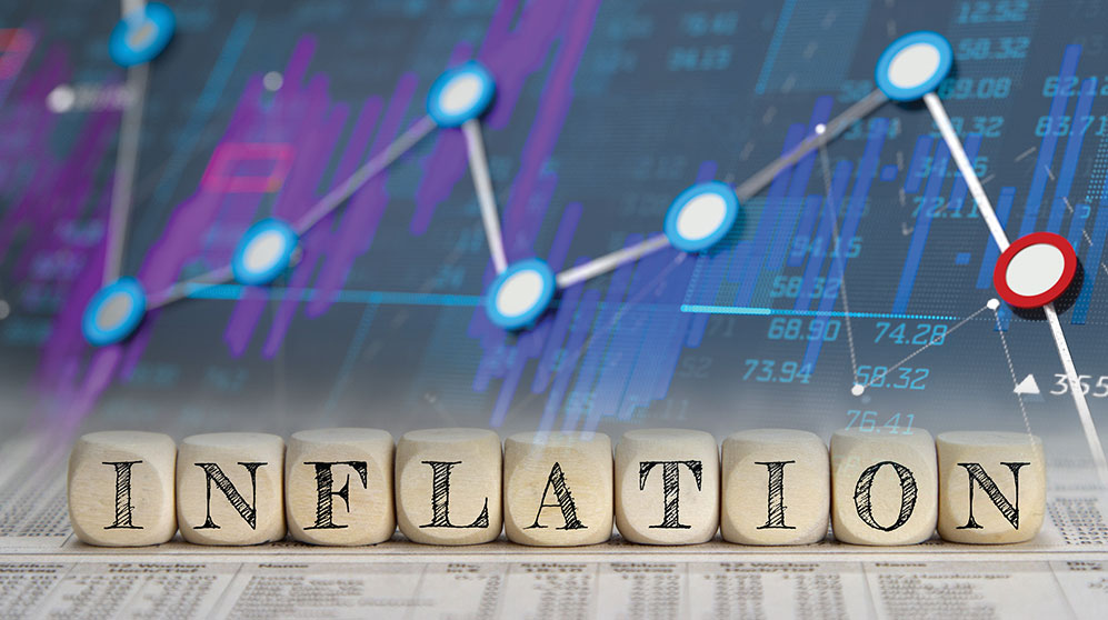 Illustration of market performance dot chart with wooden dice in foreground spelling I-N-F-L-A-T-I-O-N.