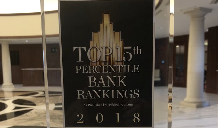 Plaque that reads "Top 15th Percentile Bank Rankings" as published by Seifried & Brew 2018"