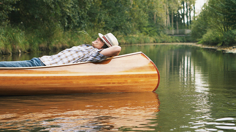 Man relaxing on a boat.