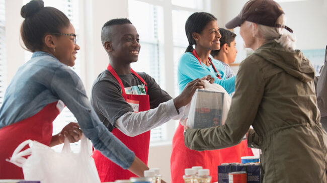 Image showing a non-profit food pantry with volunteers helping the community