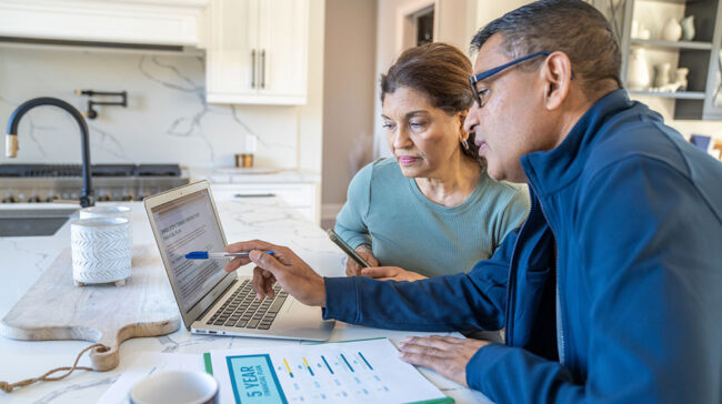 Photo of an older couple planning their retirement