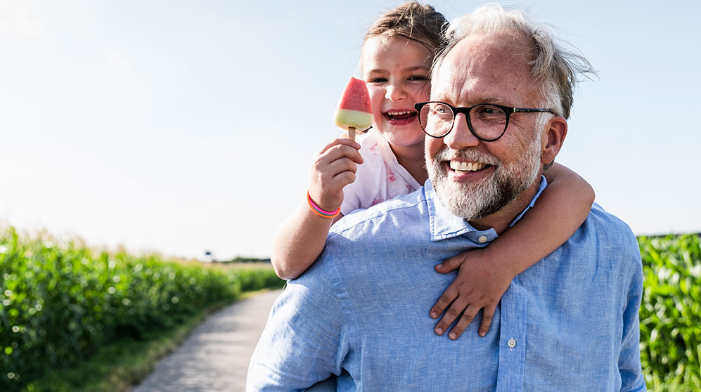 Photo of a grandfather with his granddaughter