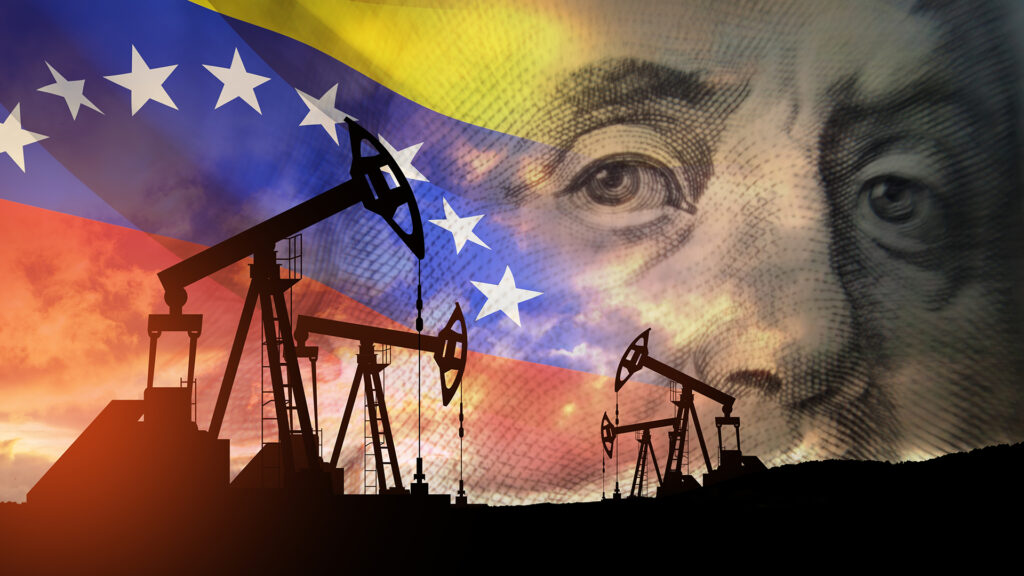 Photo of an oil pump and the Venezuela flag