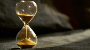 Photo of hourglass as time passing concept