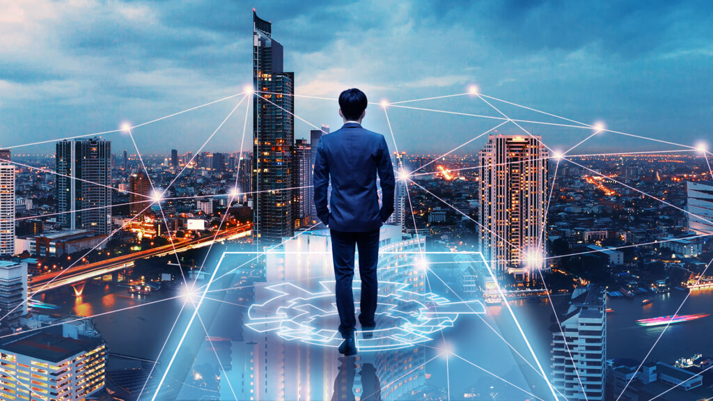Professional business man walking on future network city background and futuristic interface graphic at night